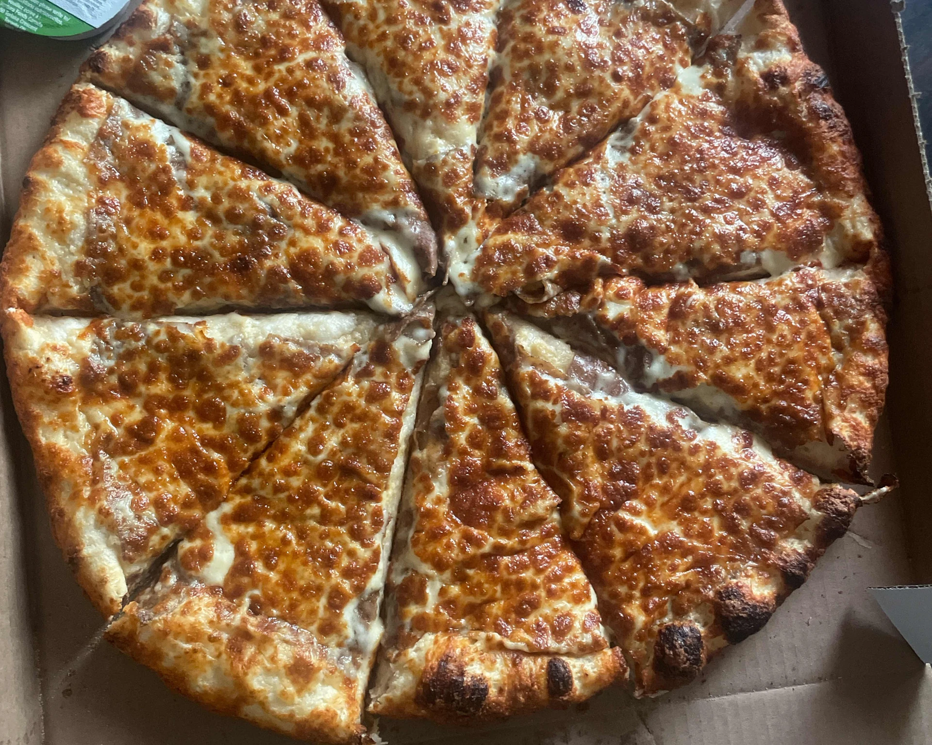 Donair Pizza with sweet donair sauce and mozzarella at Canadian Choice Pizza and Donairs in Edmonton, AB