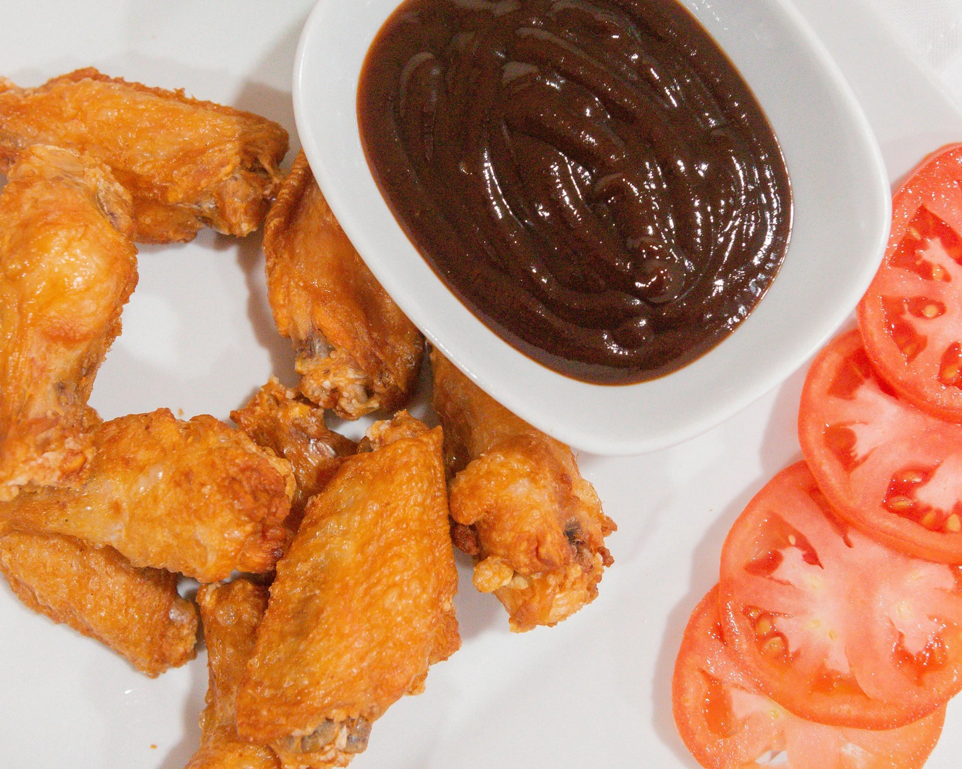 Order of ten halal chicken wings with dipping sauce at our pizza and donair shop on 127 Ave NW Edmonton